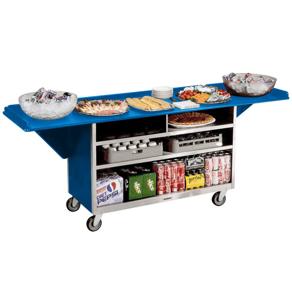 A Lakeside stainless steel drop-leaf beverage service cart with royal blue laminate shelves holding food and drinks.