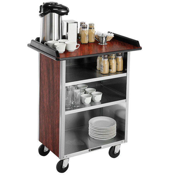 A Lakeside stainless steel beverage service cart with a coffee maker and plates.