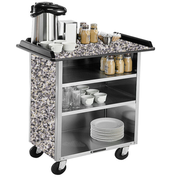 A Lakeside stainless steel beverage service cart with gray sand laminate shelves holding a variety of dishes.