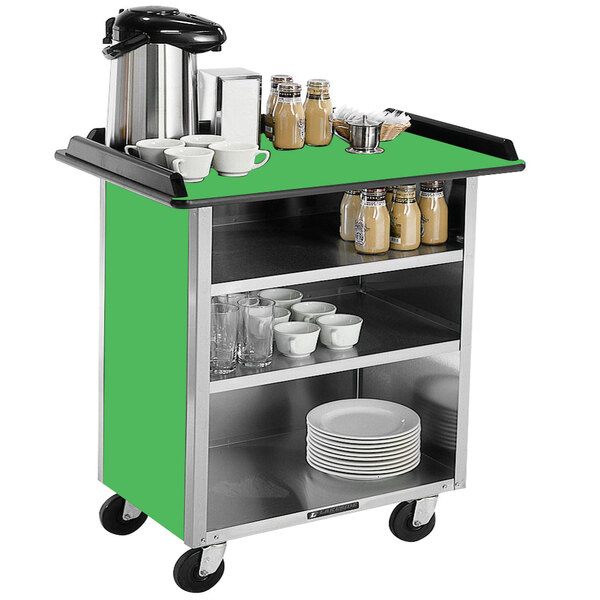 A Lakeside stainless steel beverage service cart with a green laminate finish and white dishes and cups on it.
