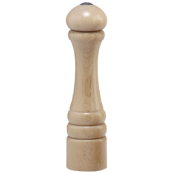 A wooden pepper mill with a black knob on a wood block.