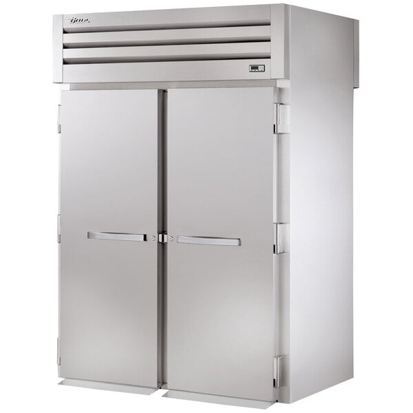 A large stainless steel True Roll-Through Refrigerator with two doors.