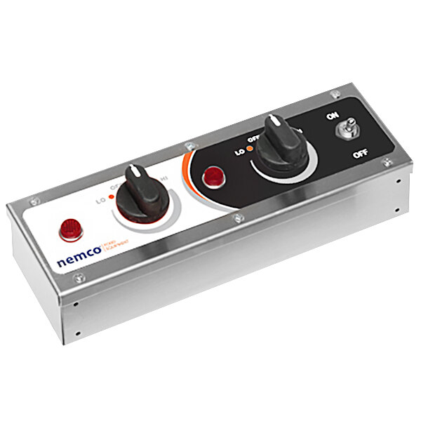 A silver control box with black and red knobs.
