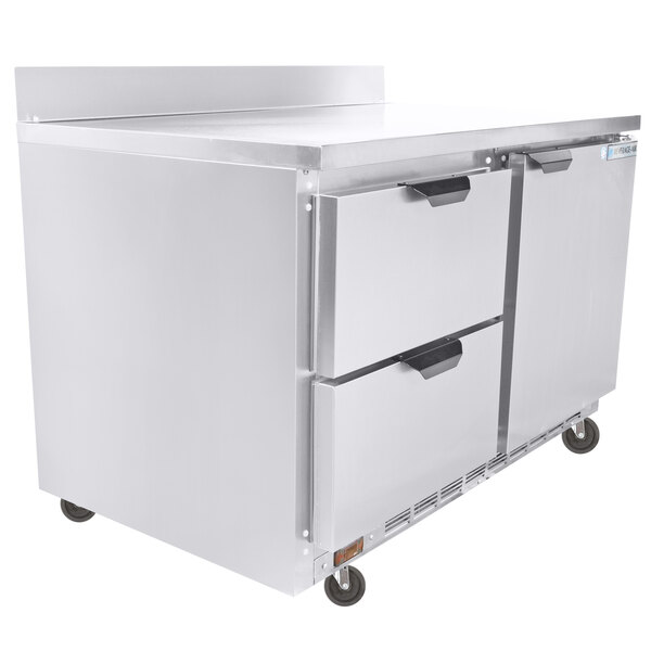 A Beverage-Air stainless steel worktop freezer with two drawers on wheels.