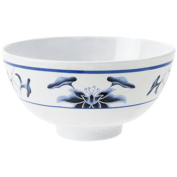 A white GET melamine bowl with blue and white water lily designs.