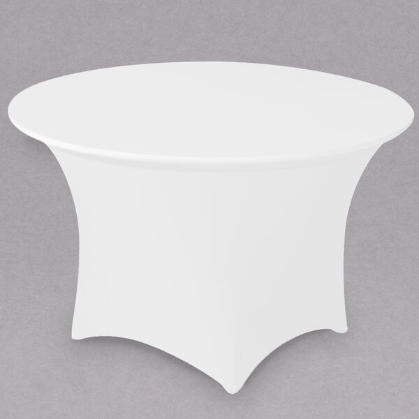 A white Snap Drape Contour spandex table cover on a round table.