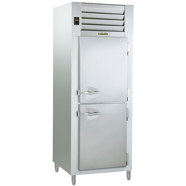 A Traulsen specification line solid pass-through heated holding cabinet with half doors.