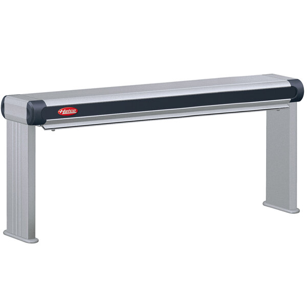 A long rectangular Hatco infrared strip warmer with black and grey ends on a metal shelf.