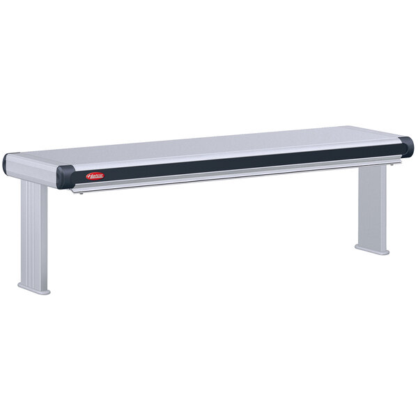 A white rectangular Hatco infrared strip warmer with black trim on a metal bench.