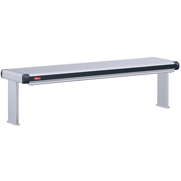 A white metal Hatco Glo-Ray strip warmer with black trim on a long stainless steel bench.
