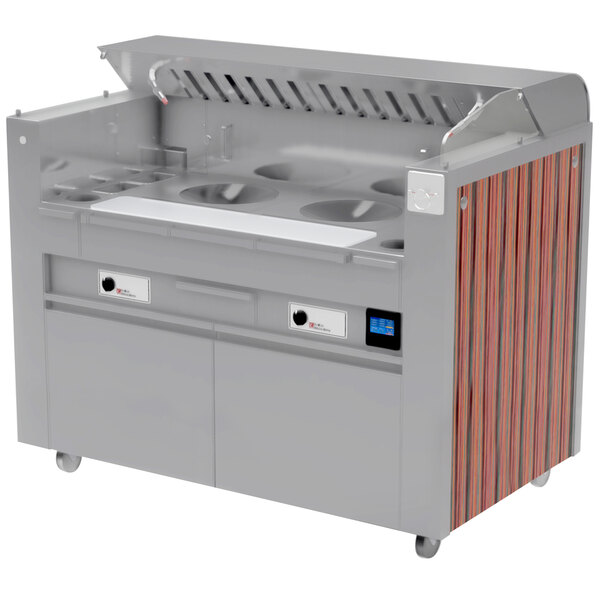 A large stainless steel Kaliber Innovations Valere Series mobile induction wok range combo cooking station.