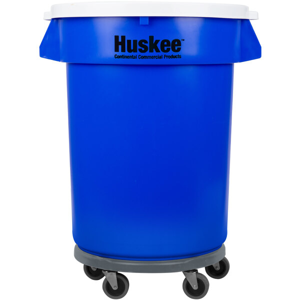 A blue Continental Huskee trash can with wheels and a lid.