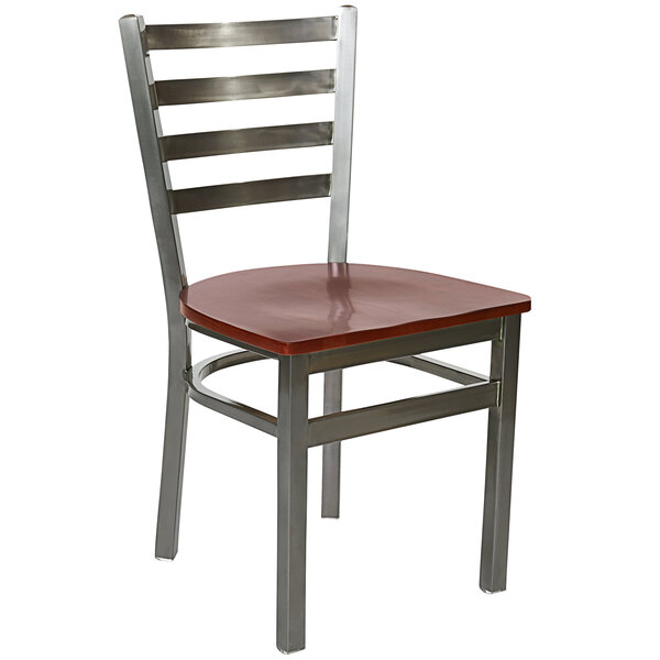 A BFM Seating metal side chair with a mahogany wooden seat.