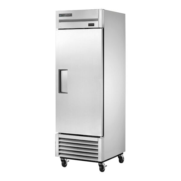 A silver True T-23-HC reach-in refrigerator with a handle on wheels.