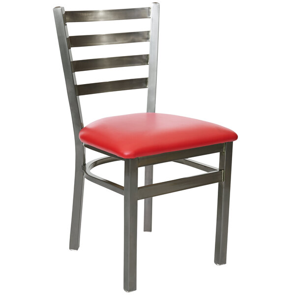 A BFM Seating steel side chair with a red cushion.