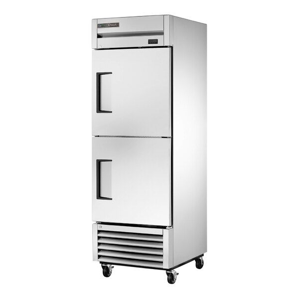 A stainless steel True single door reach-in refrigerator with black handles.
