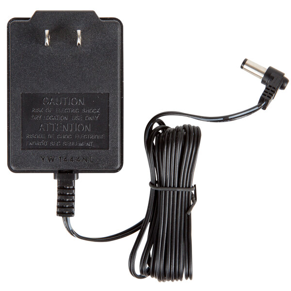 A black Cardinal Detecto 15V AC adapter with a cord.