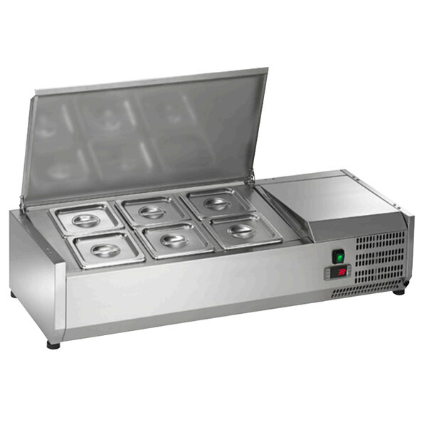 An Arctic Air stainless steel countertop refrigerated condiment prep station with four compartments.