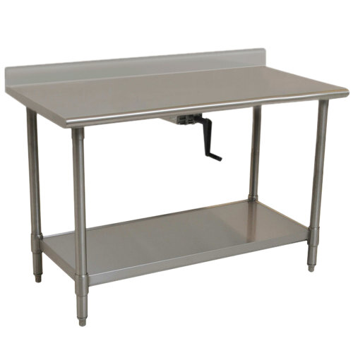 A stainless steel Eagle Group work table with a shelf and center crank.
