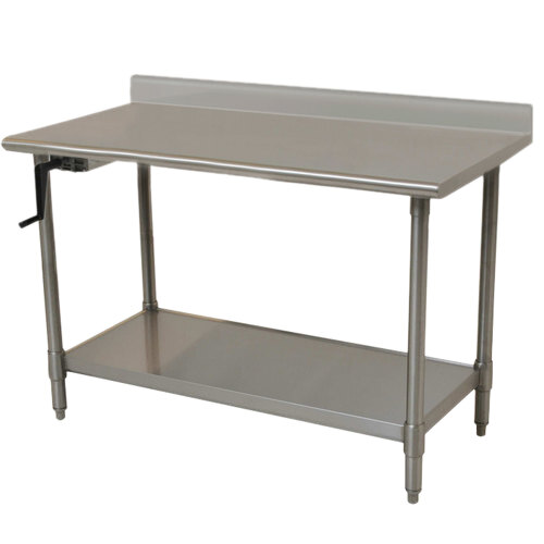 A stainless steel Eagle Group work table with a left crank for adjusting height and a shelf.