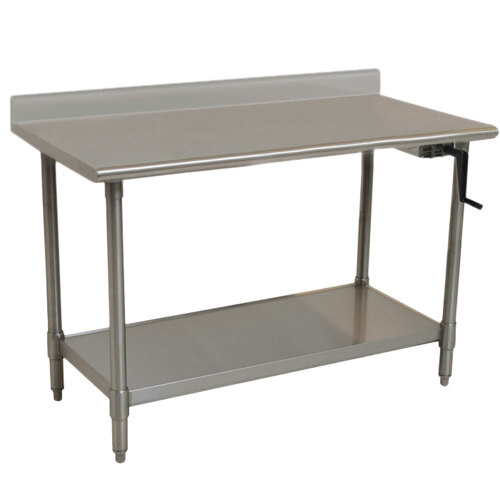 An Eagle Group stainless steel work table with a shelf.