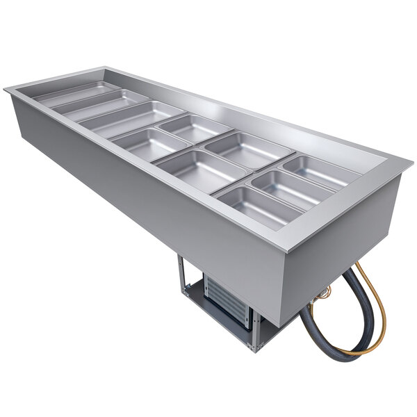 A Hatco drop-in cold food well with six slanted silver compartments.