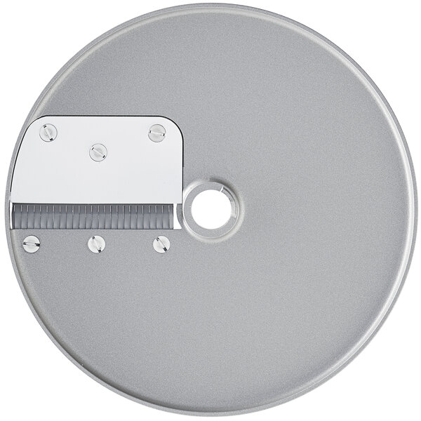 A Robot Coupe 1/8" Brunoise Cut Disc, a circular metal disc with a hole in the center.