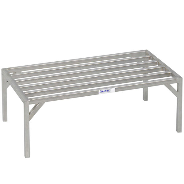 A Channel heavy-duty stainless steel dunnage rack with four legs and a shelf.