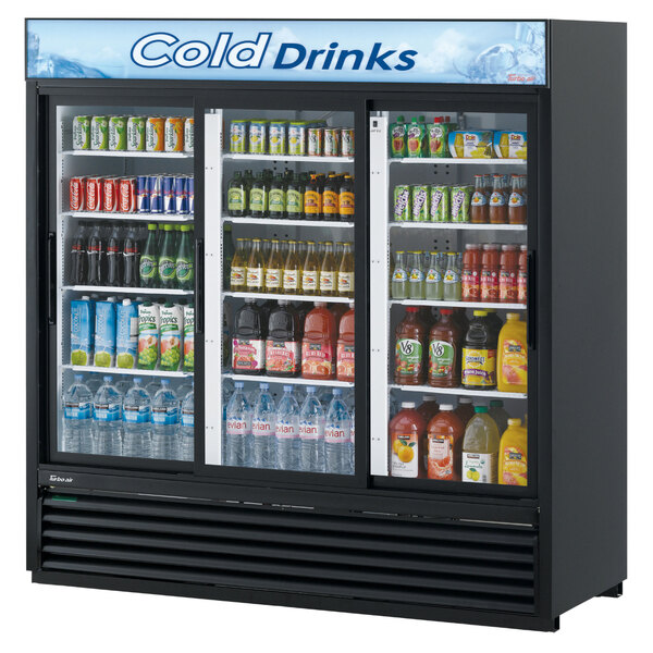 A Turbo Air TGM-69RB merchandising refrigerator with drinks inside.