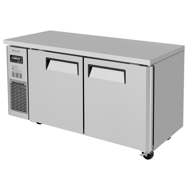 A stainless steel Turbo Air undercounter freezer with two doors.