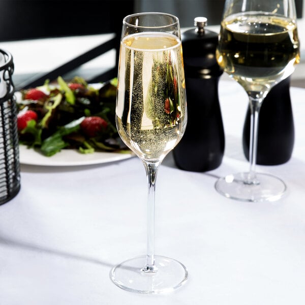Two Reserve by Libbey Prism champagne flutes on a table