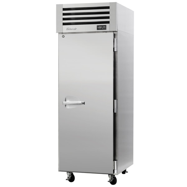 The solid door of a large silver Turbo Air Premiere Pro Series pass-through refrigerator.