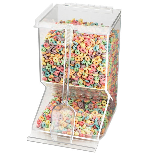 A clear plastic Cal-Mil cereal dispenser filled with colorful cereal.