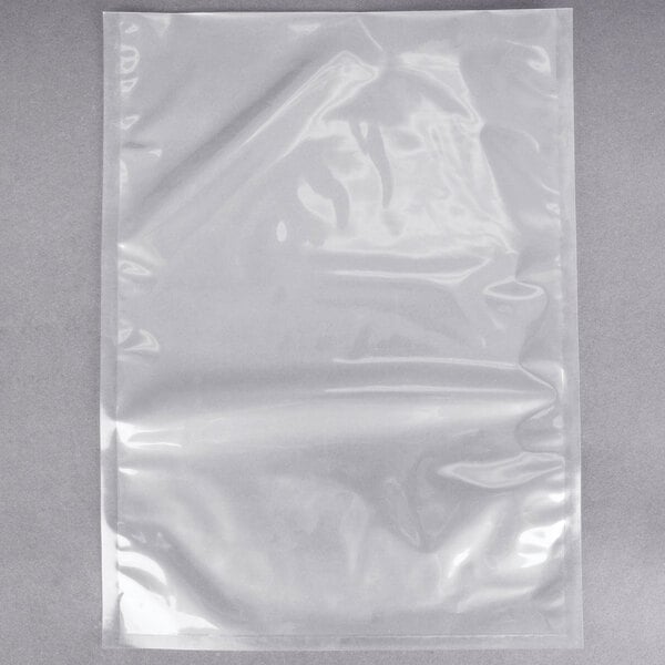 An ARY VacMaster chamber vacuum packaging bag on a gray surface.