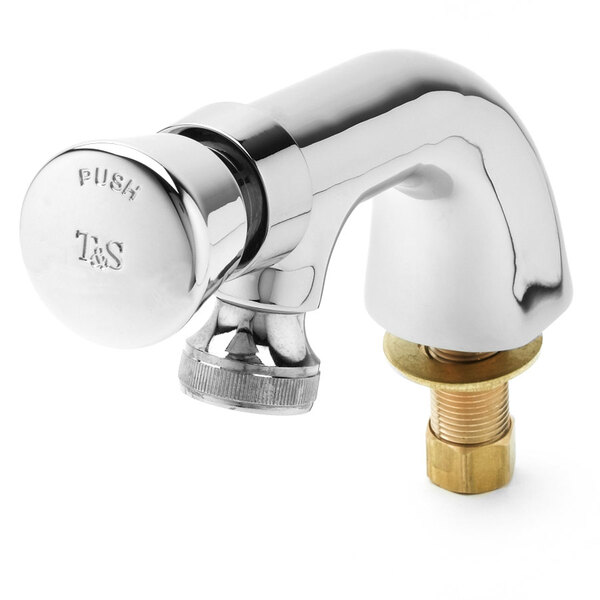 A T&S metering faucet with a brass handle and valve.