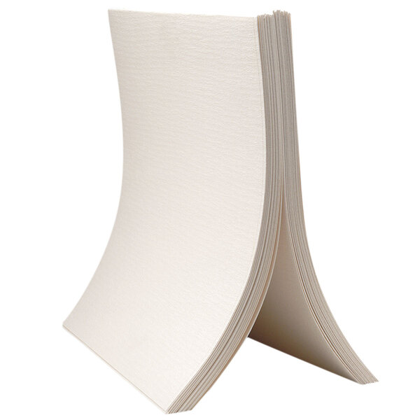 A stack of white envelope style filter paper.
