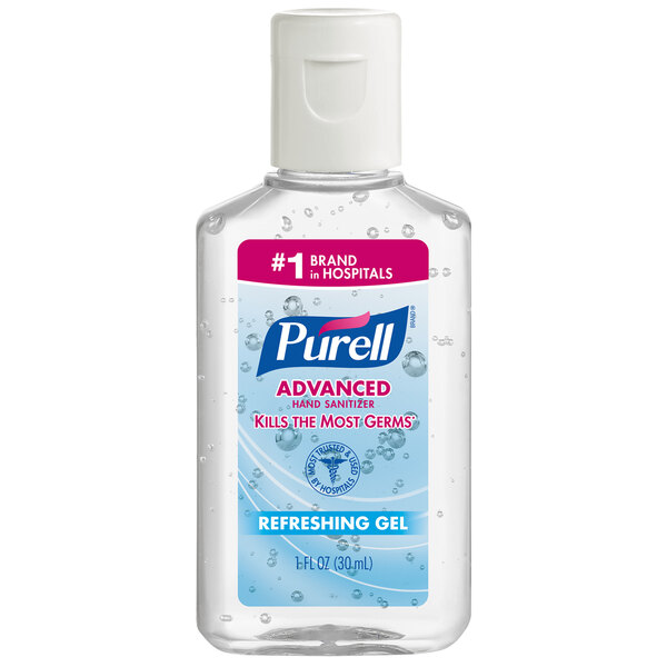 A case of 250 Purell Advanced hand sanitizer bottles on a hotel counter.
