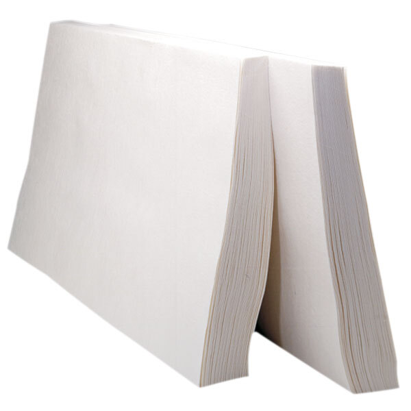 A stack of white Pitco heavy-duty flat style filter paper.