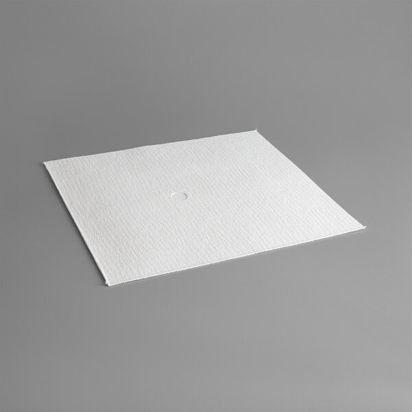 A white square object with a circle on it.