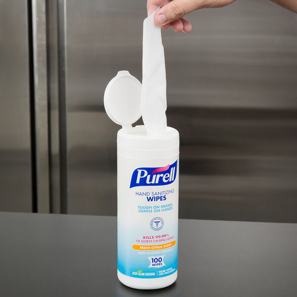 A close up of a white Purell Sanitizing Wipes container.