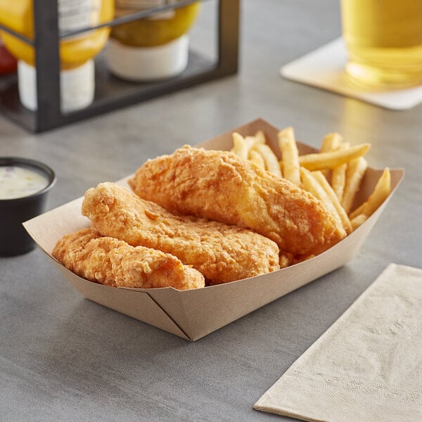 A Bagcraft Packaging EcoCraft natural Kraft paper food tray filled with fried chicken and french fries on a table with a drink.