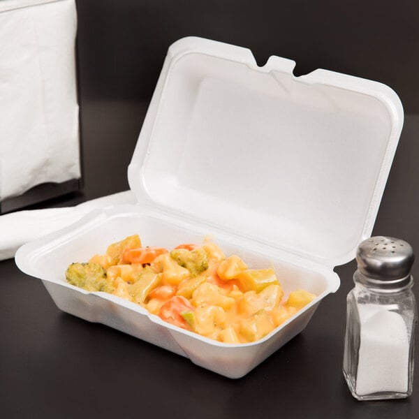 A white Genpak foam container with food in it.