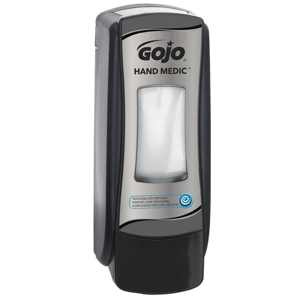 A GOJO chrome and black dispenser for hand medic soap.