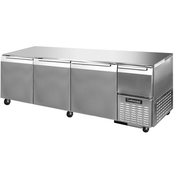 A stainless steel Continental Undercounter Refrigerator with three doors.