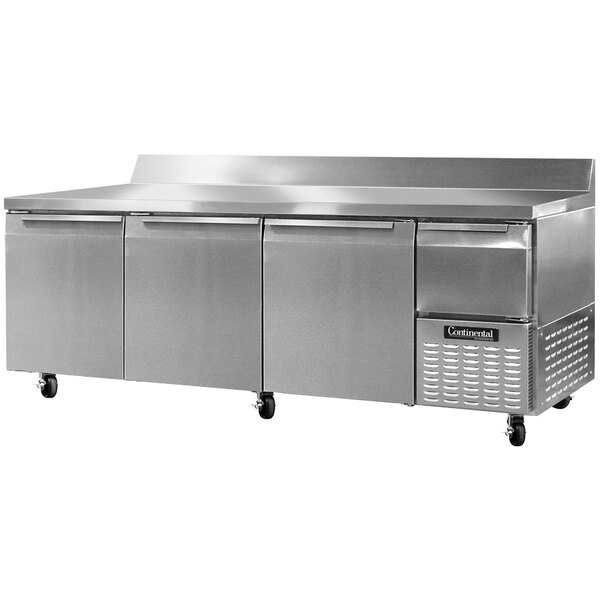 A stainless steel Continental Refrigerator worktop refrigerator with three drawers.