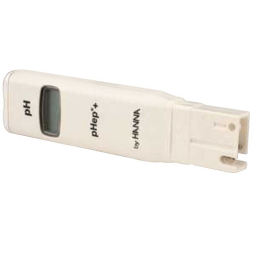 A Micro Matic hand held electronic pH meter with a white body and black screen.