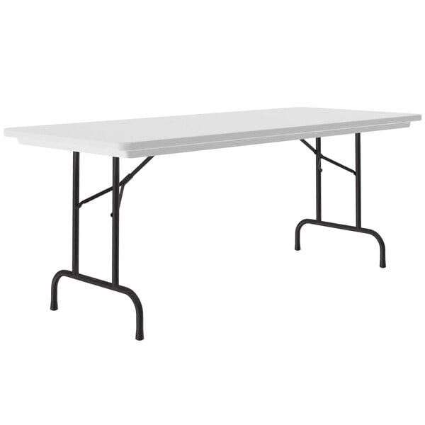 A gray granite Correll rectangular folding table with black legs.