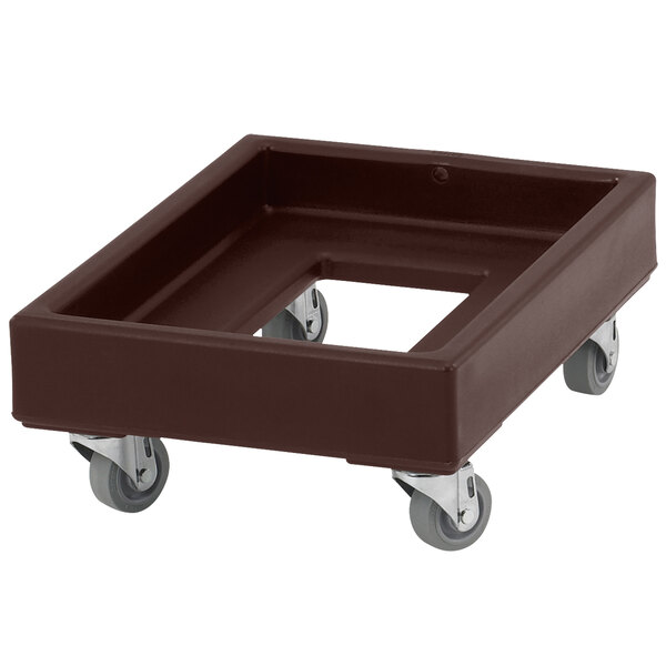 A brown plastic dolly with wheels.