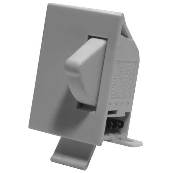A white Turbo Air door light switch.
