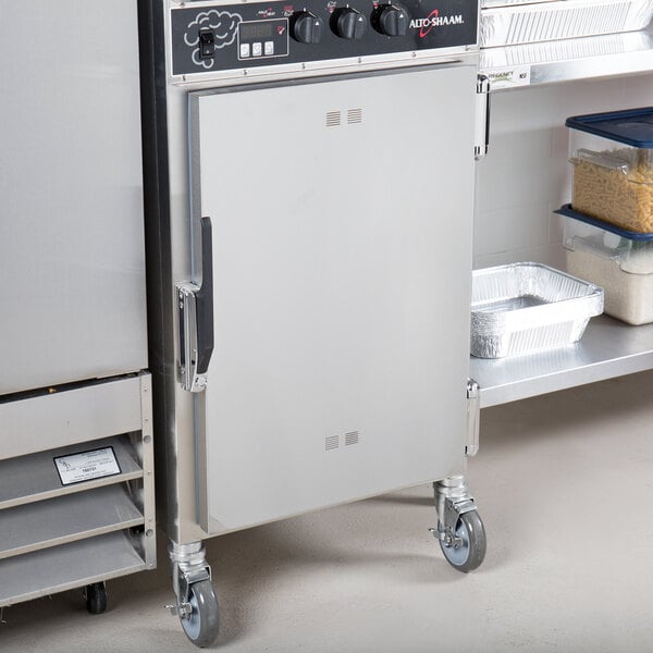 An Alto-Shaam stainless steel smoker oven with classic controls.
